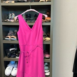 Mid length, fushia, Vince Camuto beautiful fitted body draped dress.